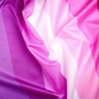 textil- rosa flagga av lesbiska, begrepp av de bekämpa för likvärdig rättigheter foto