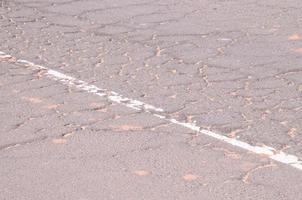 grov asfalt väg foto