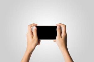 kvinna hand som håller smart telefon blank skärm foto