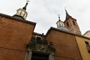 barock Fasad av de helgon nicholas kyrka iglesia de san Nicolas i madrid, Spanien foto