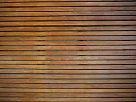 bakgrund av trä- lameller, panel, naturlig trä ribba linje, ordna mönster textur, naturlig Färg, horisontell remsa, hårt träslag, tapet med kopia Plats foto