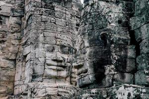 forntida sten ansikten av bayon tempel, angkor wat, siam skörd, kambodja foto