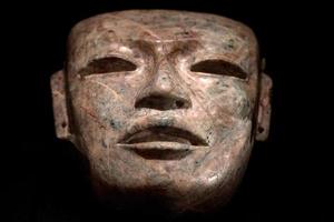 maya aztec mexikansk begravning sten ristade mask foto