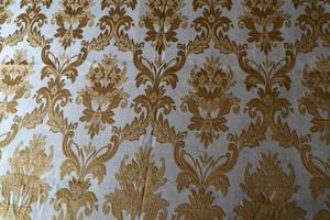 medeltida tyg textur bakgrund guld och vit foto