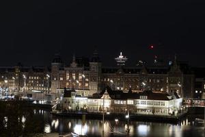 amsterdam central station på natt stadsbild foto