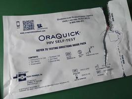 Kiev, ukraina - december 16, 2023 oraquick HIV självtest AIDS foto