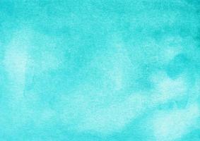 vattenfärg ljus blå bakgrund hand målad. akvarell turkos blå textur. foto