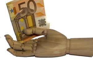 trä- hand innehav euro valuta foto