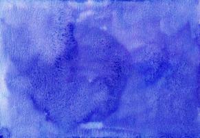 vattenfärg djup blå flytande bakgrund målning. hand målad vattenfärg bakgrund. fläckar på papper. foto