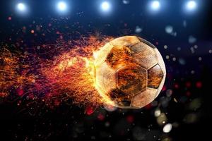 kraftfull sparka av en fotboll boll med flamma av brand foto