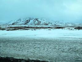 landskap med snö i island foto