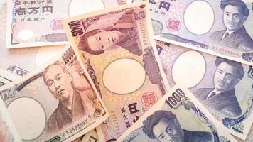 japan pengar yen sedlar. pengar årgång tona bakgrund foto