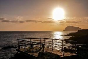 solnedgång över havet foto