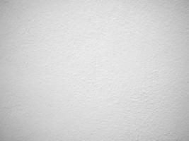 sömlös textur av vit cementvägg en grov yta, med plats för text, för en bakgrund. foto