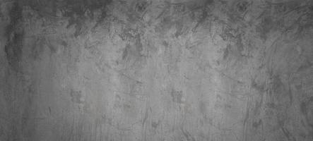 grå och svart cement eller betongvägg för bakgrund eller konsistens foto