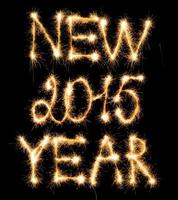 Lycklig ny år 2015 tillverkad av pärlar på svart foto