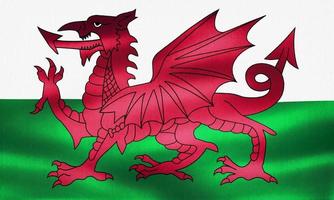 wales flagga - realistiskt viftande tygflagga foto