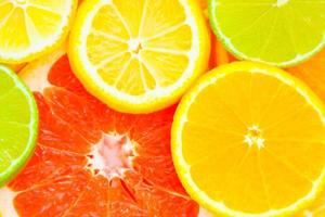 blandad citrus- frukt bakgrund foto