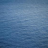 hav yta bakgrund - mörk blå hav yta foto