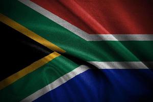 de stänga upp vågig flagga av söder afrika. de söder afrika flagga rör på sig slät foto