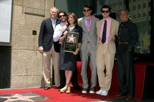 Susan helgon James henne Make söner och ron meyersusan helgon James mottar en stjärna på de hollywood promenad av berömmelse los angeles cajune 11 20082008 foto