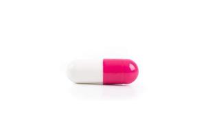 vitt och rosa piller foto