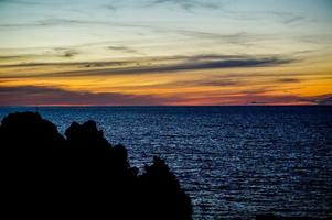 solnedgång över havet foto