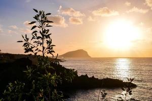 solnedgång över havet foto