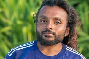 Lycklig ung maldivian man porträtt foto
