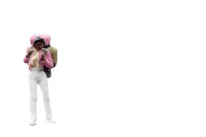 miniatyr backpacker turist isolerad på en vit bakgrund foto