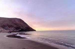 solnedgång över havet foto