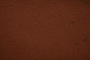 brun läder textur, årgång grov strukturera bakgrund, brun mönster foto