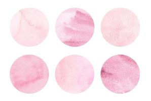 rosa korall vattenfärg cirklar uppsättning. ljus rosa runda geometrisk former på vit bakgrund. akvarell fläckar på papper textur. abstrakt konst. mall för din design. foto