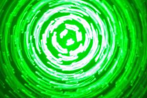 abstrakt bakgrund av grön ljus cirklar tillverkad med ljus målning Metod foto
