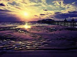 en se av Blackpool nöje strand på solnedgång foto