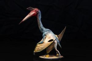 de pterosaur dinosaurie i de mörk foto