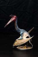 de pterosaur dinosaurie i de mörk foto