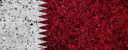 flagga av qatar på en texturerad bakgrund. begrepp collage. foto