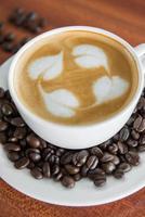 en kopp latte kaffe foto