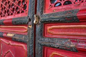 gyllene nyckel på de dörr av hall av bevara harmoni i förbjuden stad, Beijing, Kina foto