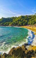 puerto escondido oaxaca mexico 2022 strand sand blå vatten enorm surfare vågor carrizalillo puerto escondido. foto