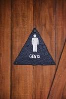 offentlig toalett tecken för manlig foto