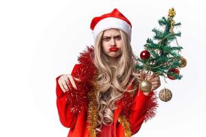 kvinna bär santa kostym dekoration gåvor jul foto
