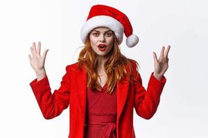 kvinna bär santa kosmetika kostym Framställ mode Semester jul foto