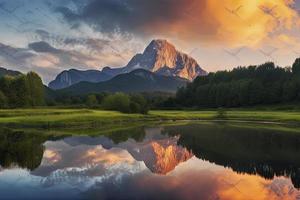 Watzmann i alperna, dramatisk reflexion på solnedgång foto