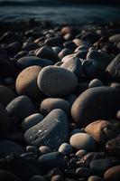 sten stenar på de strand - mjuk fokus med årgång filtrera foto