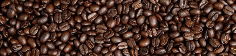 foto makro närbild textur av rostade kaffebönor mörk, kan användas som bakgrund.