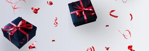 svart gåva låda med röd satin band och rosett, över vit bakgrund. foto