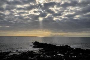 solnedgång över havet foto