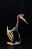 de pterosaur dinosaurie i de mörk foto